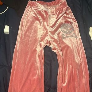 pink metallic skull flare pants